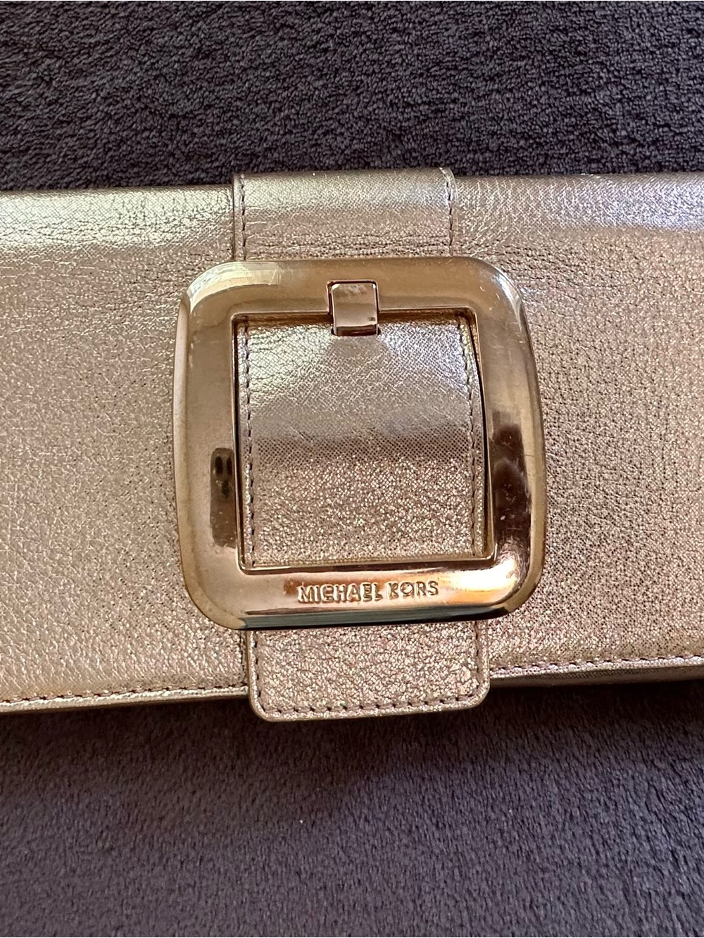 Michael Kors Metallic Rose Gold Leather Buckle Clutch